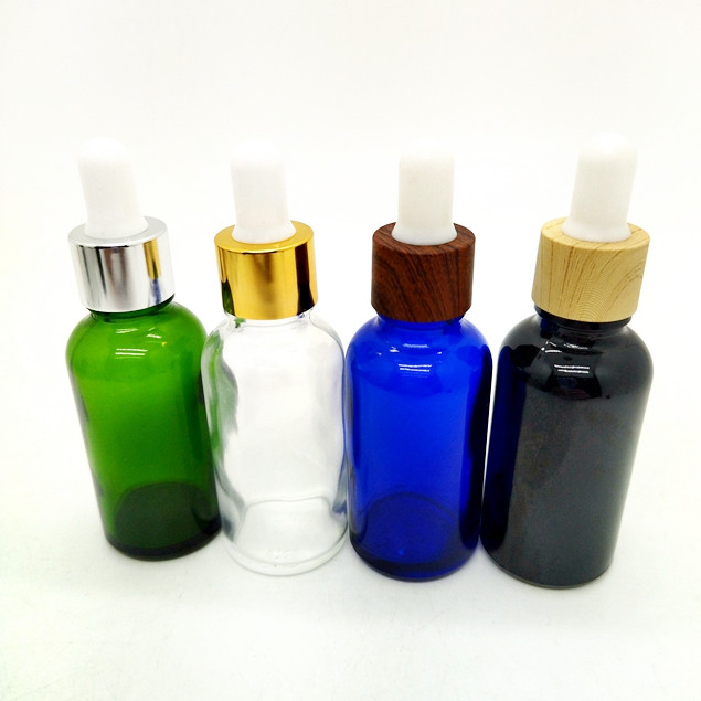 Industrial Wholesale Round Glass Essential Oil Bottle 5ml to 100ml Sizes With Seal and Dropper Pipette Hot Stamping Engraving