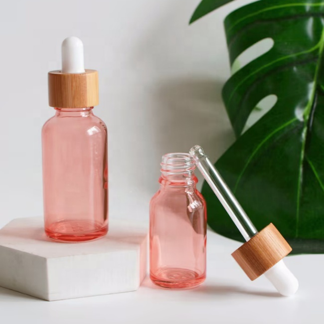 Manufacturer Round Glass Bottle 1 Oz Pink Glass Bottle 15 20 50 Ml Dropper Glass Bottle With Bamboo Cap for Cosmetic Packaging