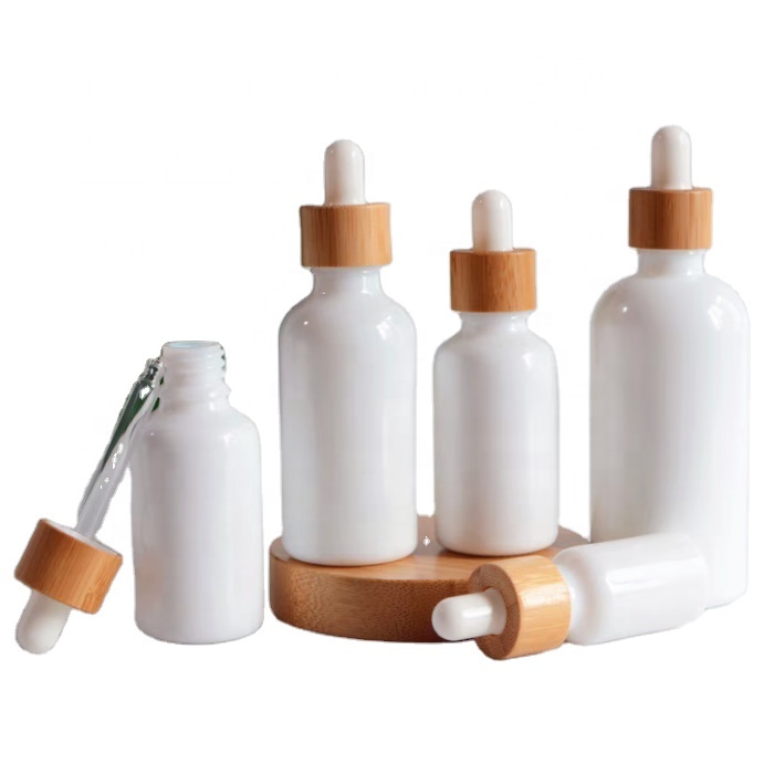 Hot Sale 5 10 15 20 30 50ml 100ml White Porcelain Essential Oil Glass Dropper Bottle  and Bamboo Lids and a Variety of Lids