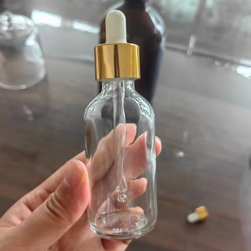 Empty Round  1 Oz 2 Oz Gold Clear Cosmetic Essential Oil Serum Transparent Glass Dropper Bottle