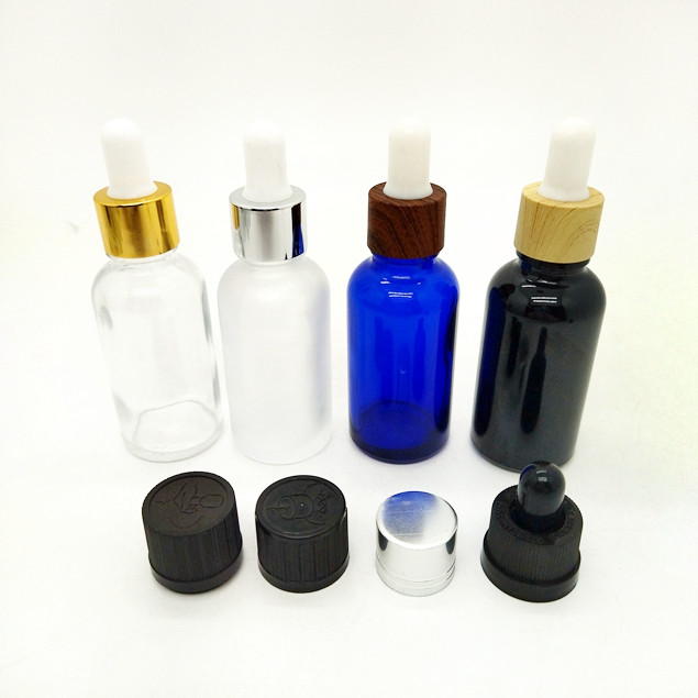 Best Selling 30ml Black Frosted Cosmetic Bottle Essential Oil Bottle With Measurement Pipette and Paper Tube Packaging Glass Bottle