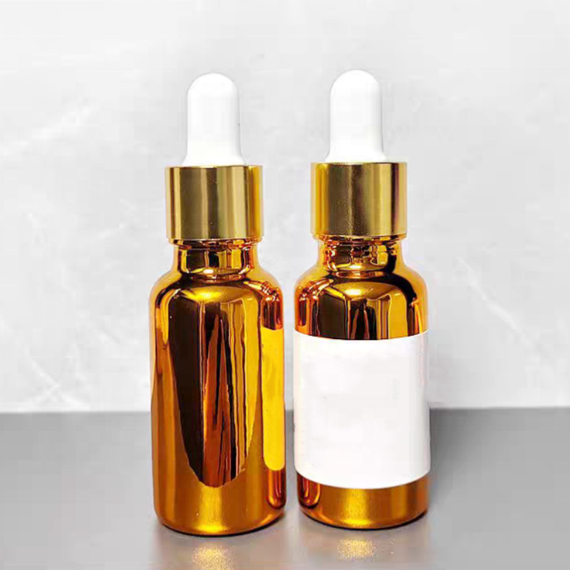 Wholesale Uv Protection Gold or Silver Glass Bottle With Dropper Screw Cap Hot Stamped for Essential Oil and Cosmetic Liquids