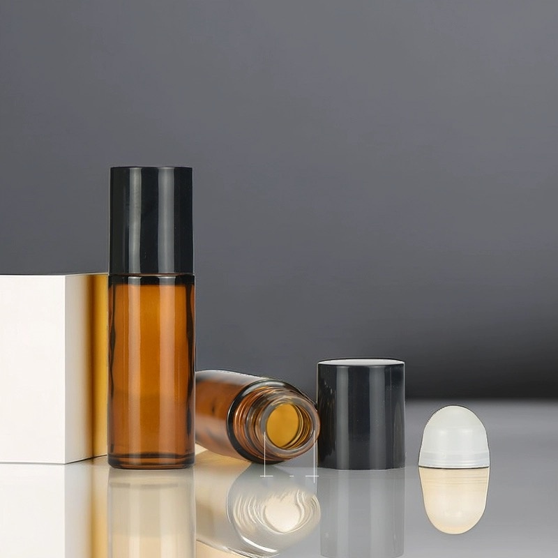Wholesale Empty Essential Oil Perfume Oil 30ml 50ml Clear Blue Amber Roll on Glass Bottle With Steel Roller Ball