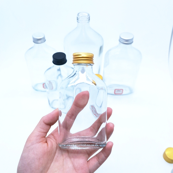 2024 New Launch 50ml 100ml 200ml 250ml 350ml 500ml Custom Empty Glass Liquor Bottle With Screw Cap