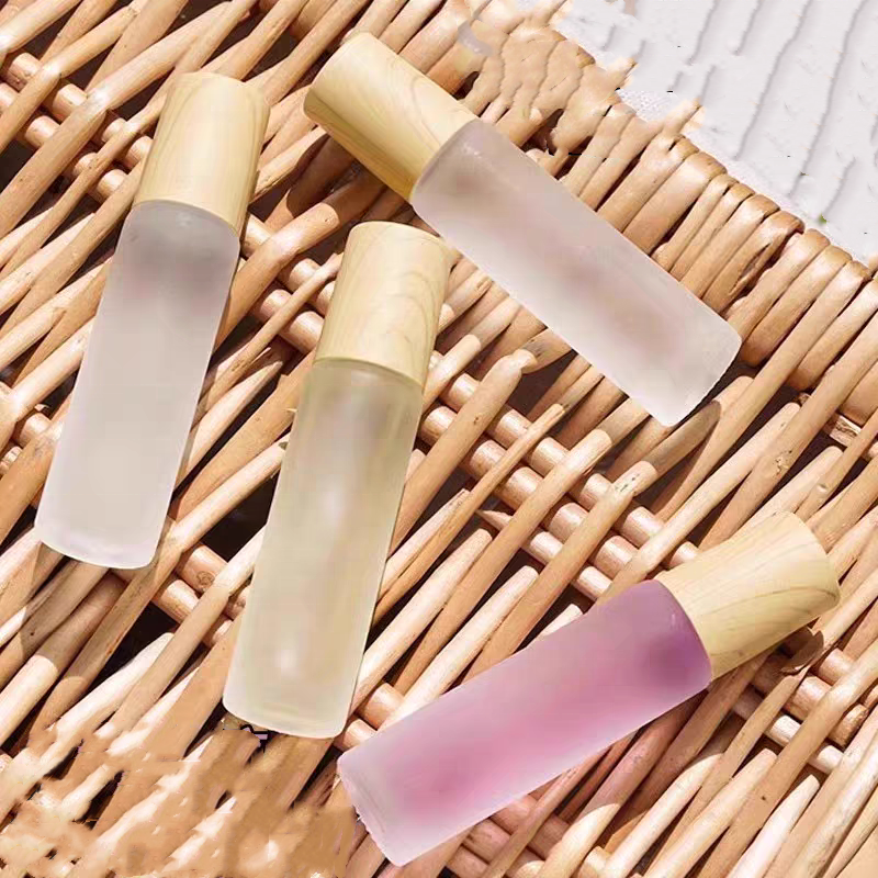 Wholesale Oem 10ml 15ml Custom Logo Empty Round Tall Frosted Luxury Glass Perfume Eye Oil Roll on Bottle with Roller Ball