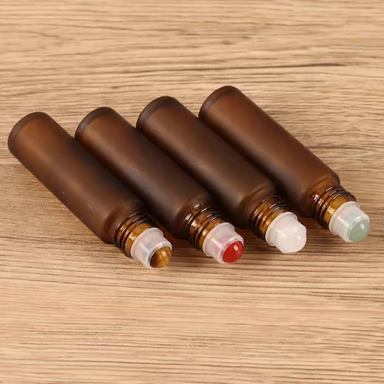 Hot Sale 10ml Glass Roll on Bottle Perfume Essential Oil Glass Bottle Frosted Amber Roller Ball Glass Bottle with Bamboo Cap