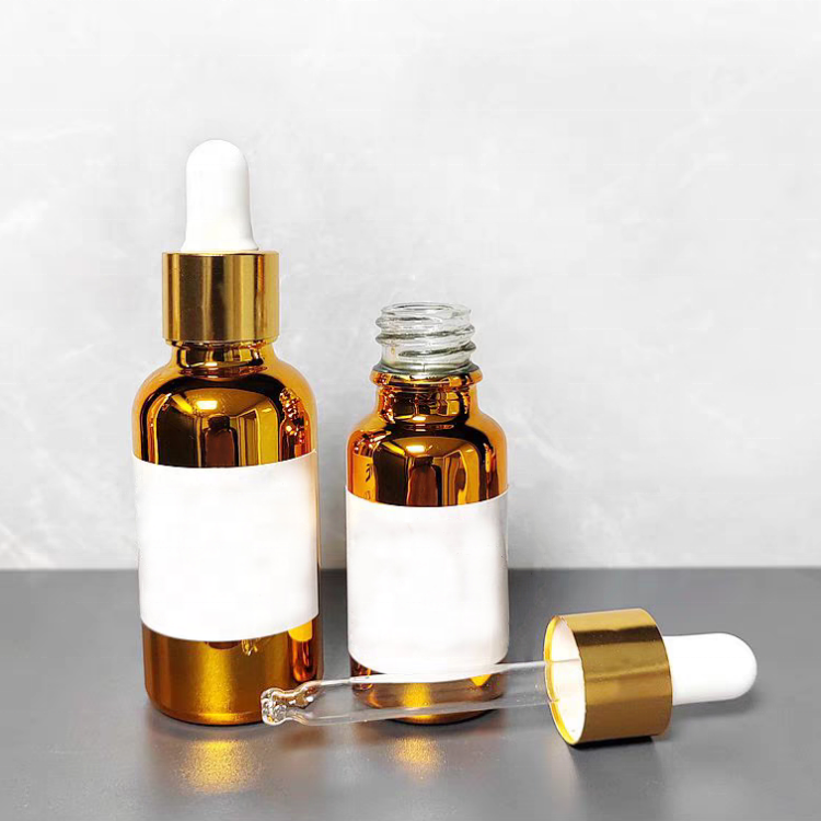 Wholesale Uv Protection Gold or Silver Glass Bottle With Dropper Screw Cap Hot Stamped for Essential Oil and Cosmetic Liquids