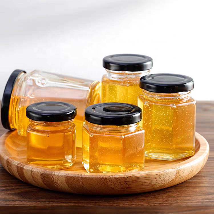 China Manufacturer Cheap 40ml 85ml 100ml 180ml 280ml 380ml 500ml Glass Honey Jar Transparent Hexagon Glass Jars
