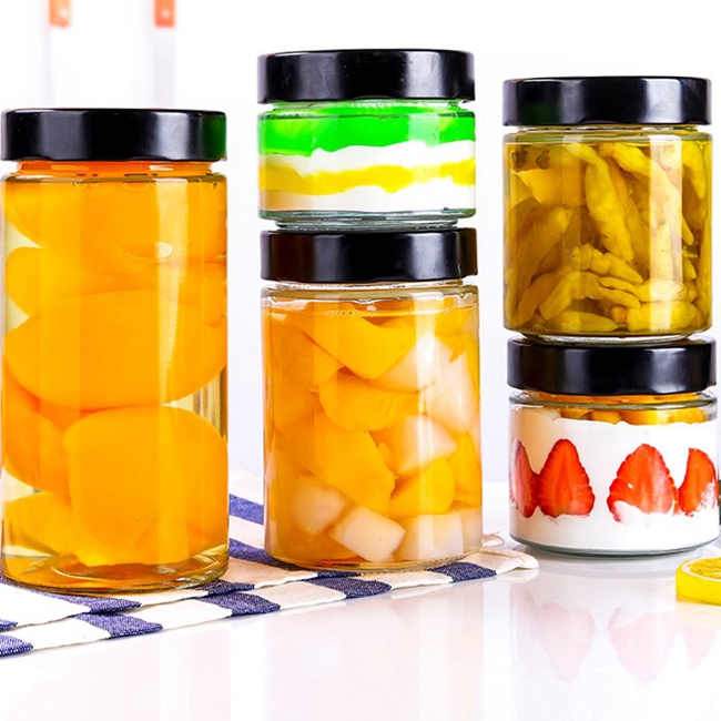 Eco Friendly 70ml 100ml 150ml 250ml 300ml 500ml Honey Spice Pudding Jar Round Glass Food Storage Jar With Black Metal Screw Lid