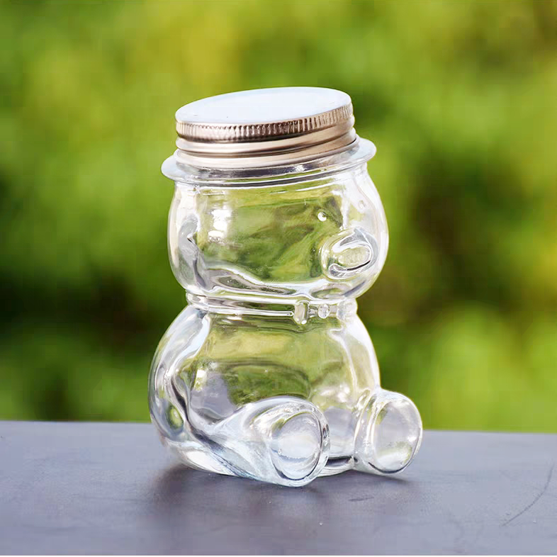 Wholesale Teddy Bear Shaped Glass Bottle Honey Bee Candy Sugar Chocolate Glass Jar With Metal Cap