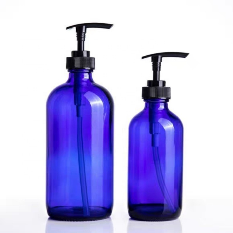 Factory Wholesale Clear Amber Blue Boston Bottle Glass Essential Oil Bottle With Pump