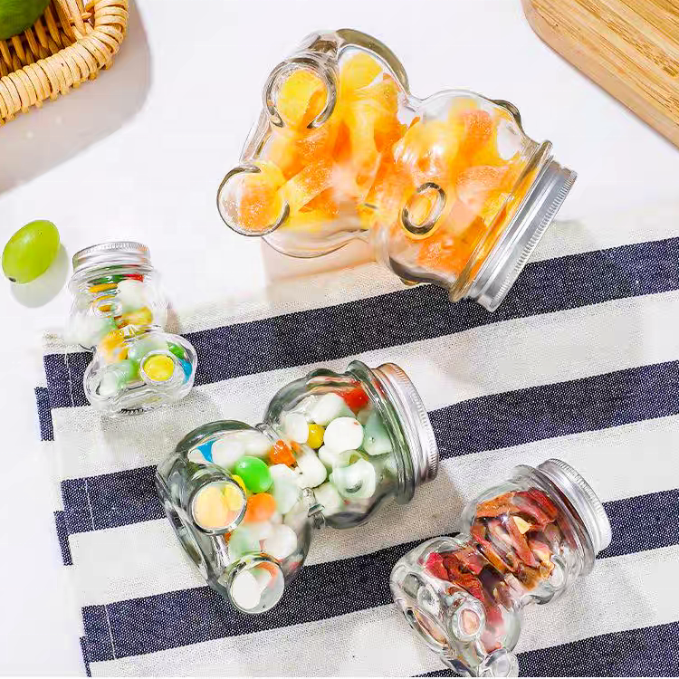 Wholesale Teddy Bear Shaped Glass Bottle Honey Bee Candy Sugar Chocolate Glass Jar With Metal Cap