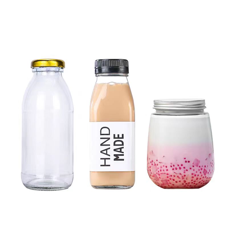 Recyclable Hot Sale 300ml 350ml 500ml  Round Glass Drinking Bottle Clear Milk Bottle With Metal Lid for Beverage Package