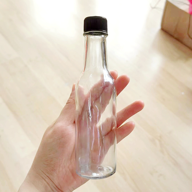Factory Stock 150ml Glass Woozy Bottle BPA-Free 5oz Clear Glass Hot Sauce BBQ Sauce Bottle Shrink Capsules Food Oil Label