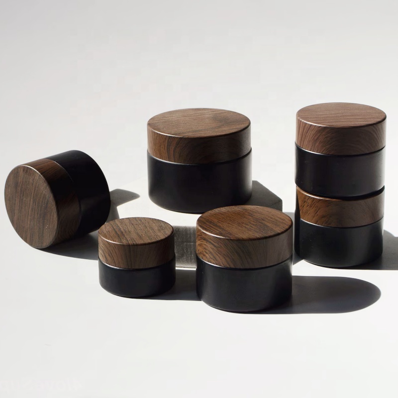 In Stock Wholesale 5/10/15/20/30/50g Matte Black Face Cream Jar Containers 1 2 4 Oz Glass Jars With Plastic Wood Grain Lid