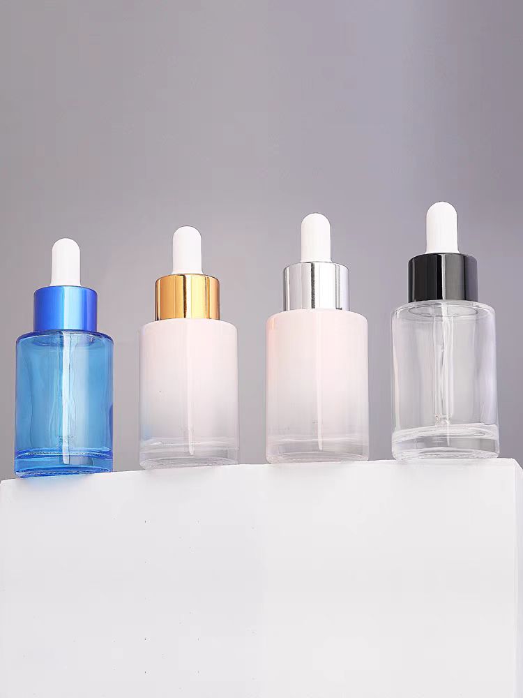 Custom Color 30 ml 1oz  Empty Essential Oil Bottle Round Glass Hair Oil Dropper Bottles With Plastic Dropper Lids