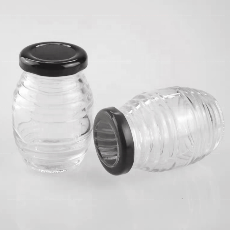 China Factory 100g 250g 500g 1000g Bee Storage Pot Container Thread Shaped Honey Jars Honeycomb Shaped Glass Honey Jars