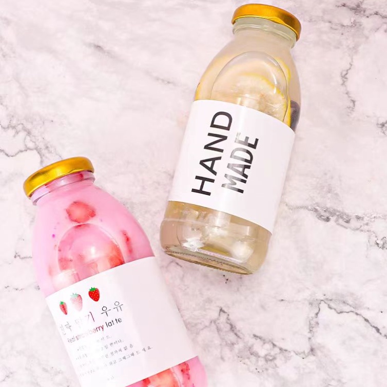 Recyclable Hot Sale 300ml 350ml 500ml  Round Glass Drinking Bottle Clear Milk Bottle With Metal Lid for Beverage Package
