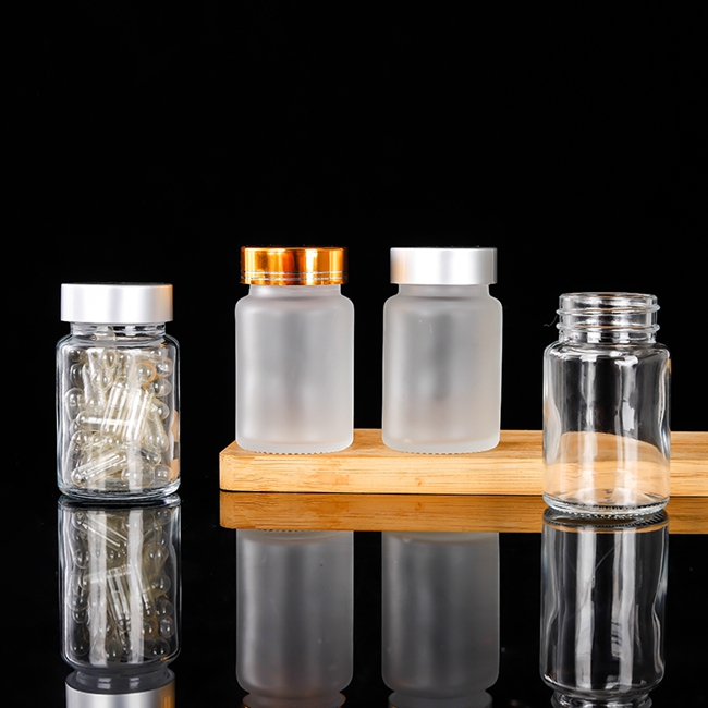 Cheap Price 60cc 100cc 200cc clear Frosted Glass Pill Supplement Capsule Bottle With Aluminum Lid Safety Seal