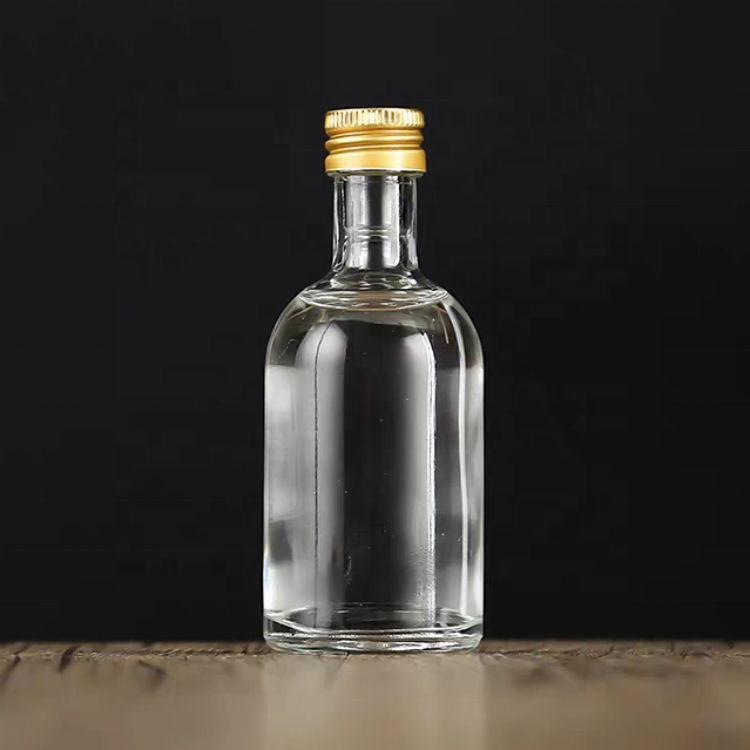 Wholesale Custom 50ml Round Mini Wine Bottle Wedding Favor 50 Ml Liquor Small Whisky Vodka Glass Bottle With Screw Metal Cap