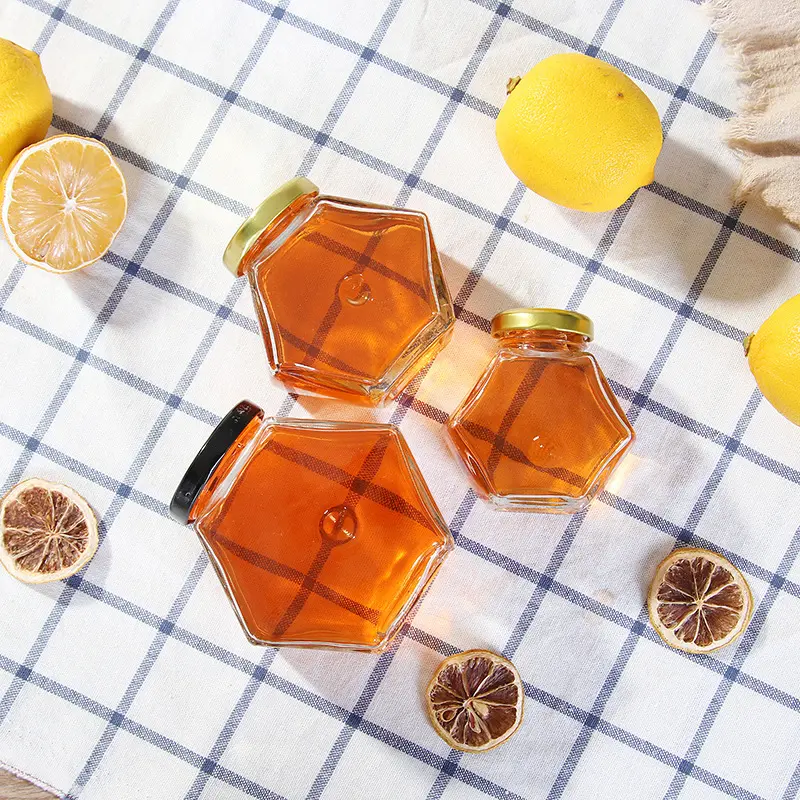 High Quality 100ml 220ml 380ml Hexagonal Transparent Glass Honey Jar Glass Storage Bottle With Bamboo Cover