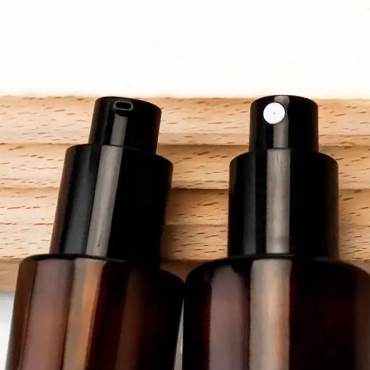 Hot Sale Amber Glass Pump Bottles With Flat Shoulder 30ml 50ml 80ml 100ml Refillable Serum Essential Oil Perfume Lotion Bottle